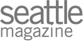 The image shows a logo with the text "Seattle Magazine" in gray, featuring a modern, sans-serif font.